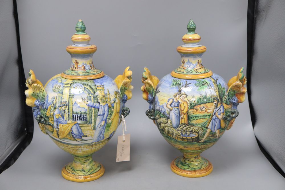 A pair of Italian maiolica vases and covers, height 37cm